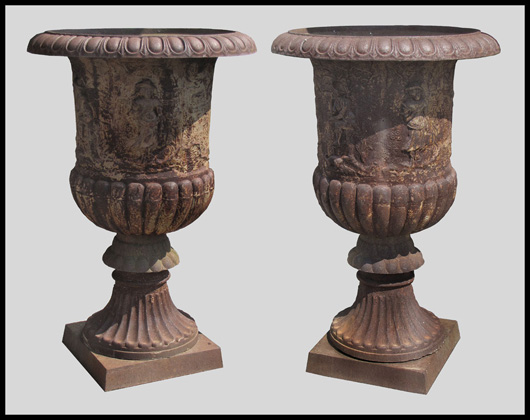 Pair of monumental Victorian cast-iron Campari garden urns, 50 inches high, 32 inches in diameter. Image courtesy of William Jenack Estate Appraisers and Auctioneers.
